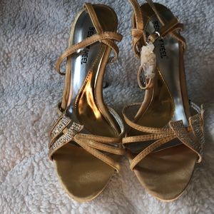 Gorgeous gold dress sandal never worn